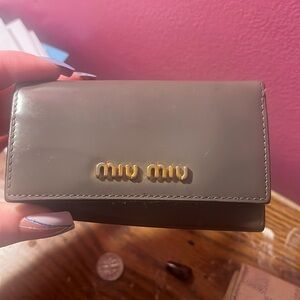 Miu miu key holder looks almost brand new just missing one key on the inside !